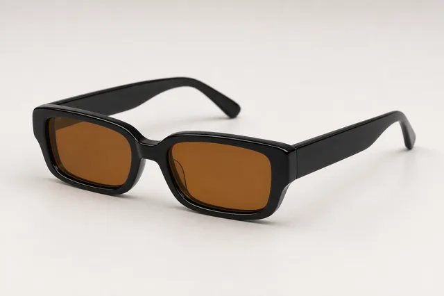 Product photo — black rectangular sunglasses with amber lenses